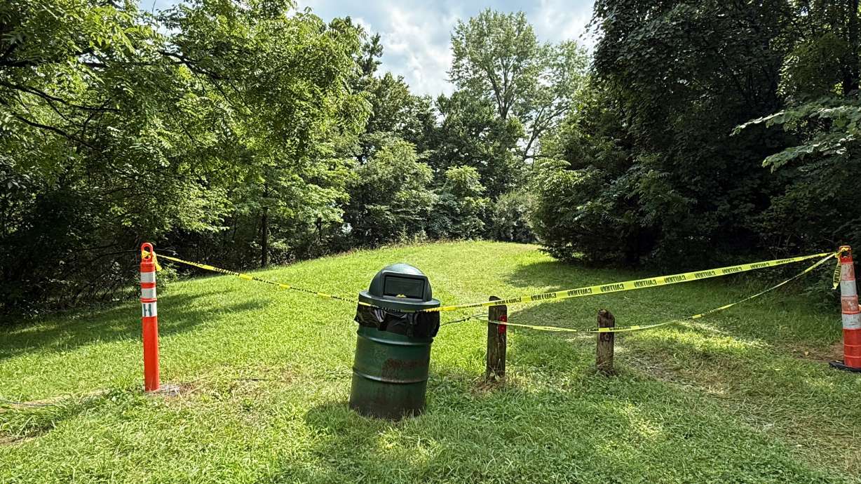 A section of the Riverside Dr Scioto Fishing Area is sectioned off on Tuesday, in Powell, Ohio. Honduran authorities confirmed on Wednesday that four of the five adults that drowned in the river were Honduran citizens — both married couples.