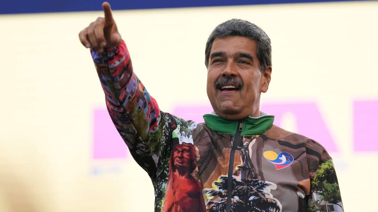 Venezuelan President Nicolas Maduro points to supporters during a campaign rally in the Catia neighborhood of Caracas, July 18, 2024. Maduro is expected to be in court in New York on Wednesday.