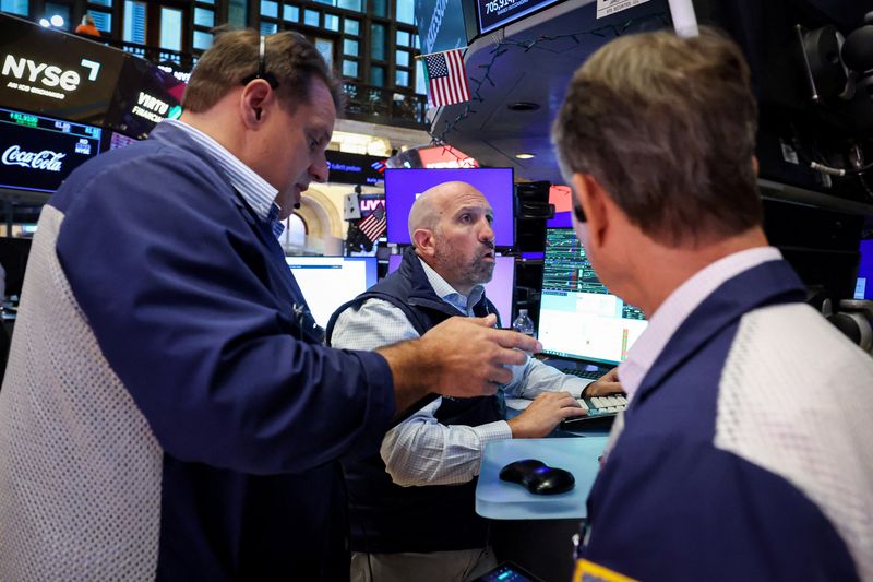 Traders work on the floor at the New York Stock Exchange in New York City, on Monday.