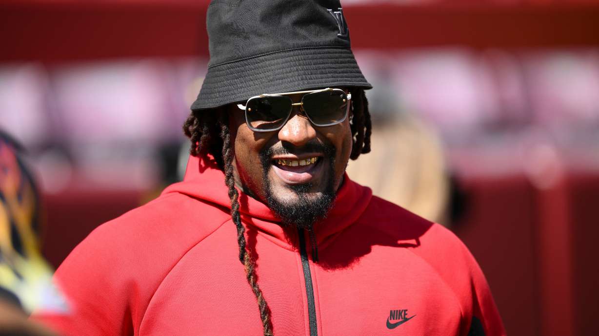 FILE - Marshawn Lynch looks on before an NFL preseason football game between the Washington Commanders and the Baltimore Ravens, Aug. 23, 2025, in Landover, Md.