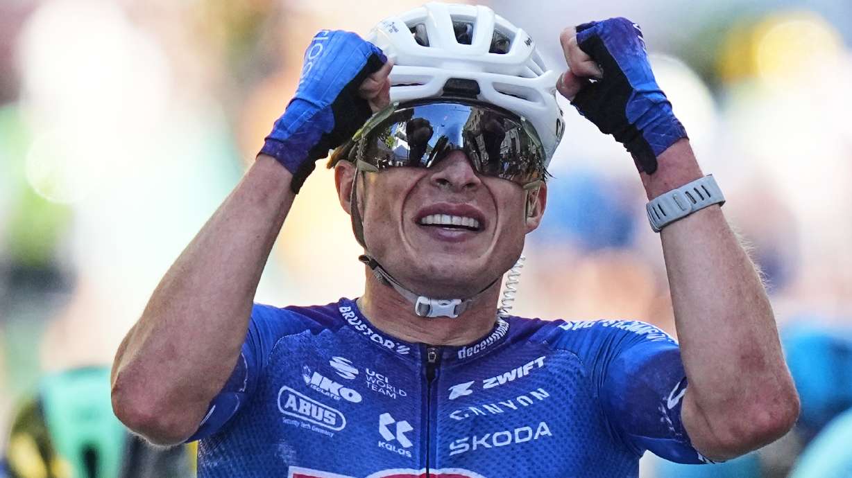 Belgium's Jasper Philipsen crosses the finish line to win the seventeenth stage of the Tour de France cycling race, with start in Chambery and finish in Voiron France, Wednesday, July 22, 2026.