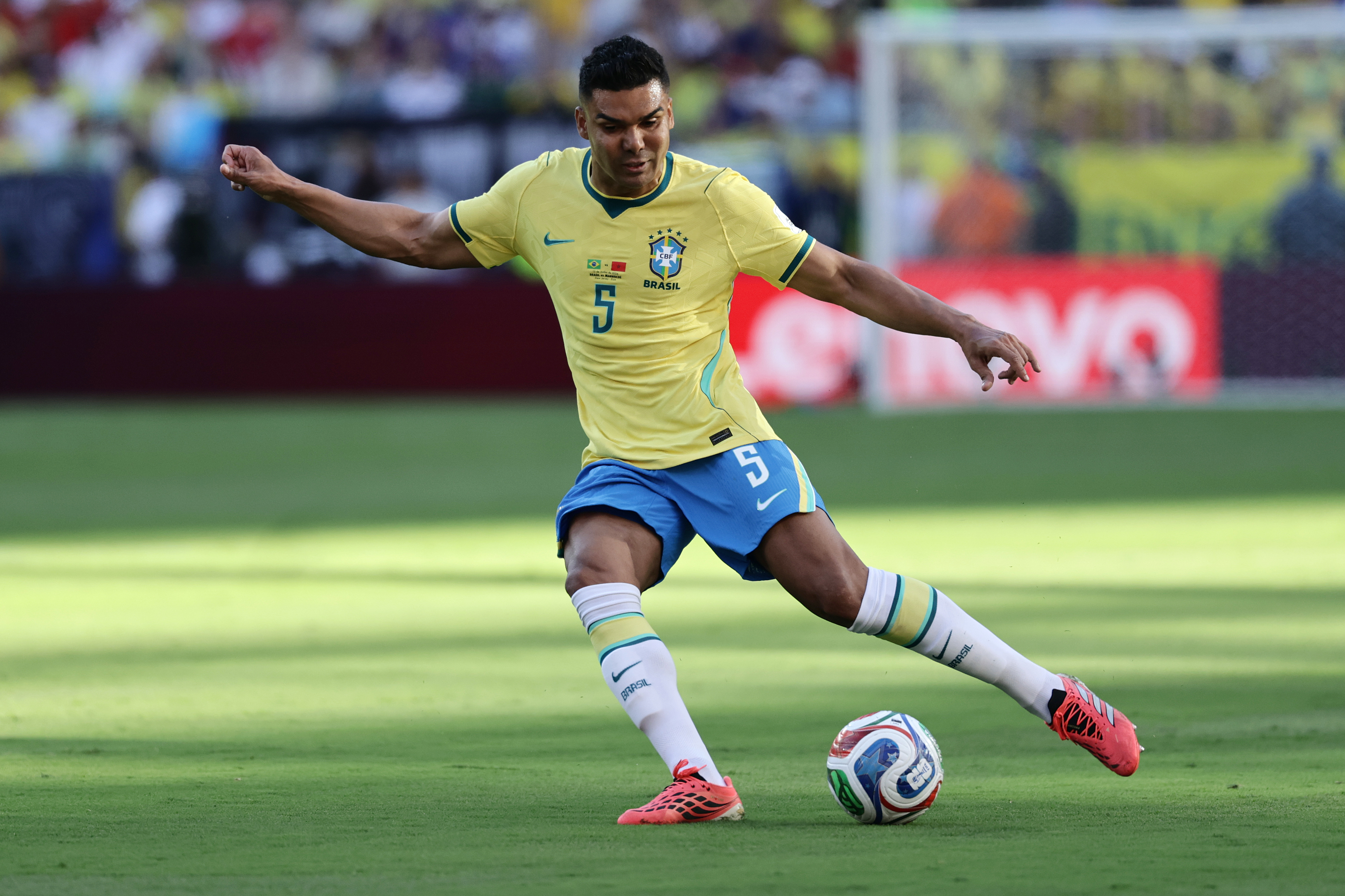 FILE - Brazil's Casemiro  kicks the ball in the first half during the World Cup Group C soccer match between Brazil and Morocco in East Rutherford, N.J., near New York, Saturday, June 13, 2026. (AP Photo/Adam Hunger, File(