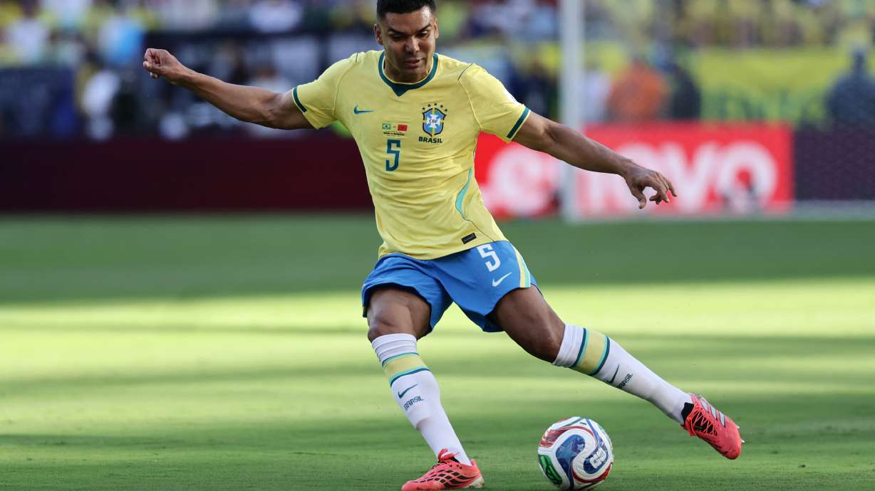 FILE - Brazil's Casemiro kicks the ball in the first half during the World Cup Group C soccer match between Brazil and Morocco in East Rutherford, N.J., near New York, Saturday, June 13, 2026. (AP Photo/Adam Hunger, File(