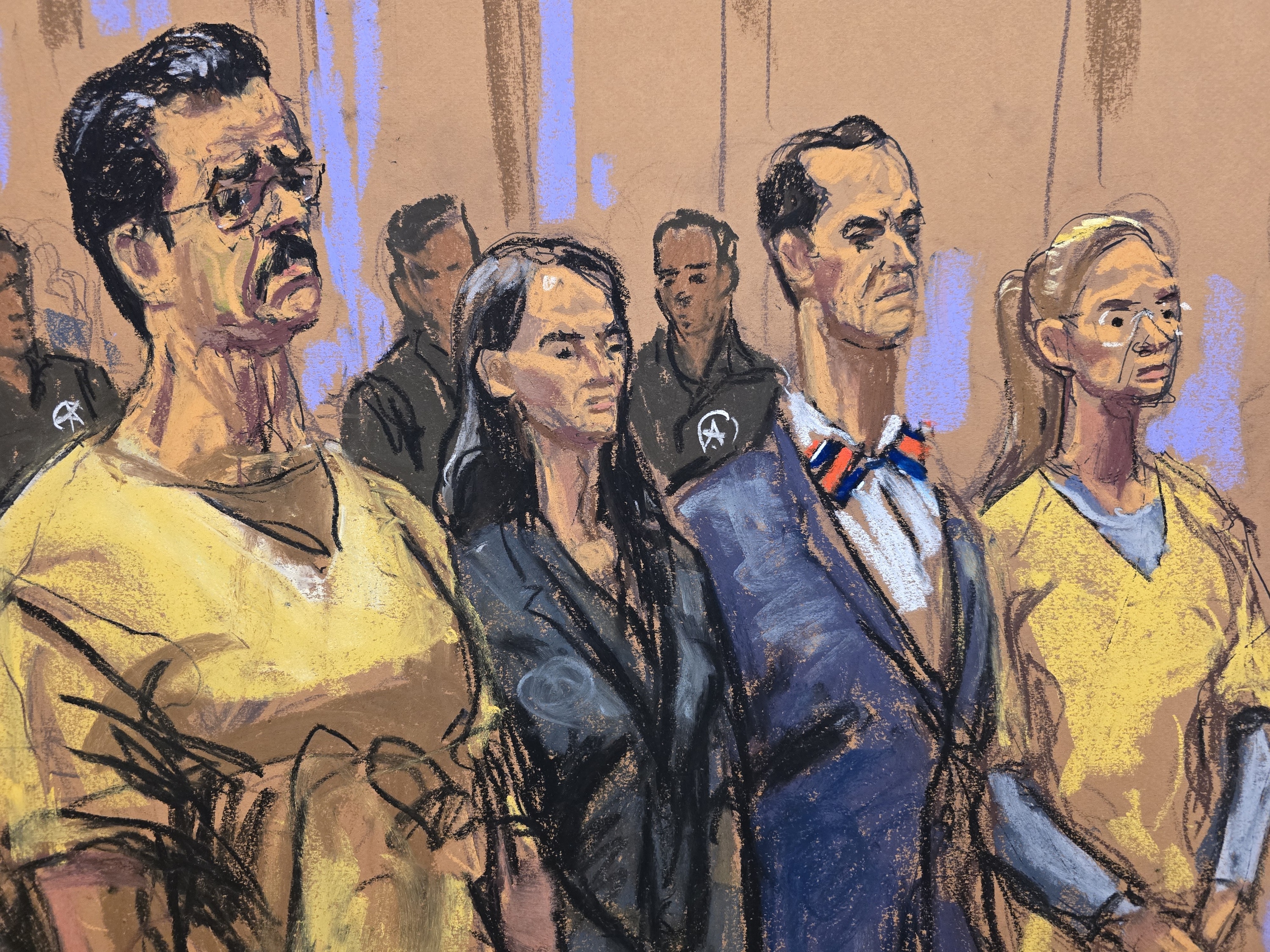 In this courtroom sketch, former Venezuela President Nicholas Maduro, attorneys Anna Estevao and Mark Donnelly, and Maduro's wife, Cilia Flores, during a pretrial hearing in a drug trafficking case for Maduro and Flores, July 22, at Manhattan federal court in New York. Maduro was hit with human rights abuse charges on Thursday.