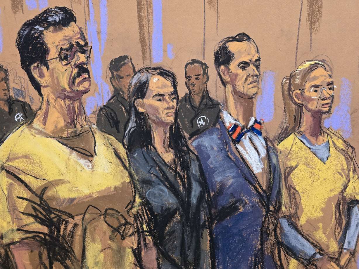 In this courtroom sketch, former Venezuela President Nicholas Maduro, attorneys Anna Estevao and Mark Donnelly, and Maduro's wife, Cilia Flores, during a pretrial hearing in a drug trafficking case for Maduro and Flores, July 22, at Manhattan federal court in New York. Maduro was hit with human rights abuse charges on Thursday.