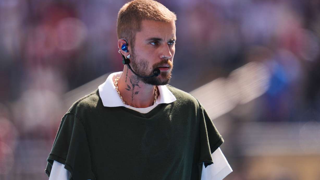 Justin Bieber leaves the pitch after performing at halftime during the World Cup final soccer match between Spain and Argentina in East Rutherford, N.J., near New York, Sunday, July 19, 2026.