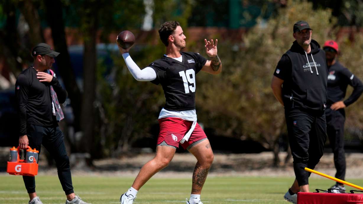 FILE - Arizona Cardinals quarterback Carson Beck (19) throws during the NFL football team's rookie minicamp on May 8, 2026, in Tempe, Ariz.