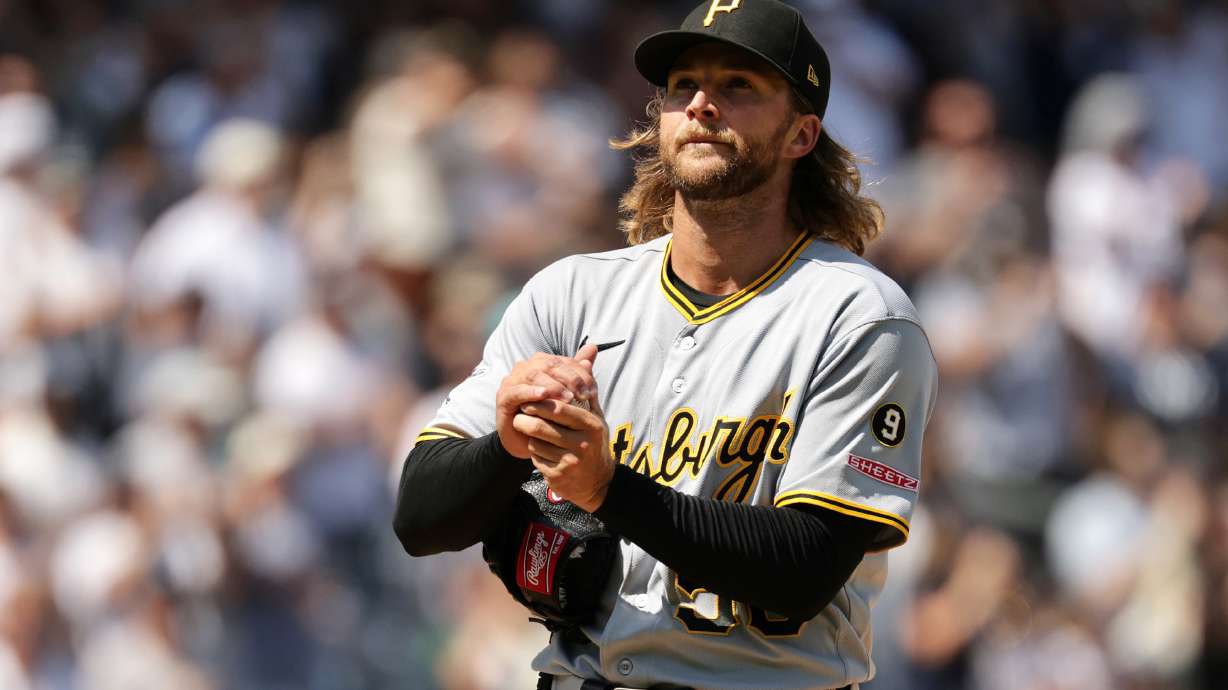 Pittsburgh Pirates pitcher Carmen Mlodzinski reacts after giving up a three-run home run to New York Yankees' Ben Rice in the seventh inning during the first baseball game of a doubleheader, Wednesday, July 22, 2026, in New York.