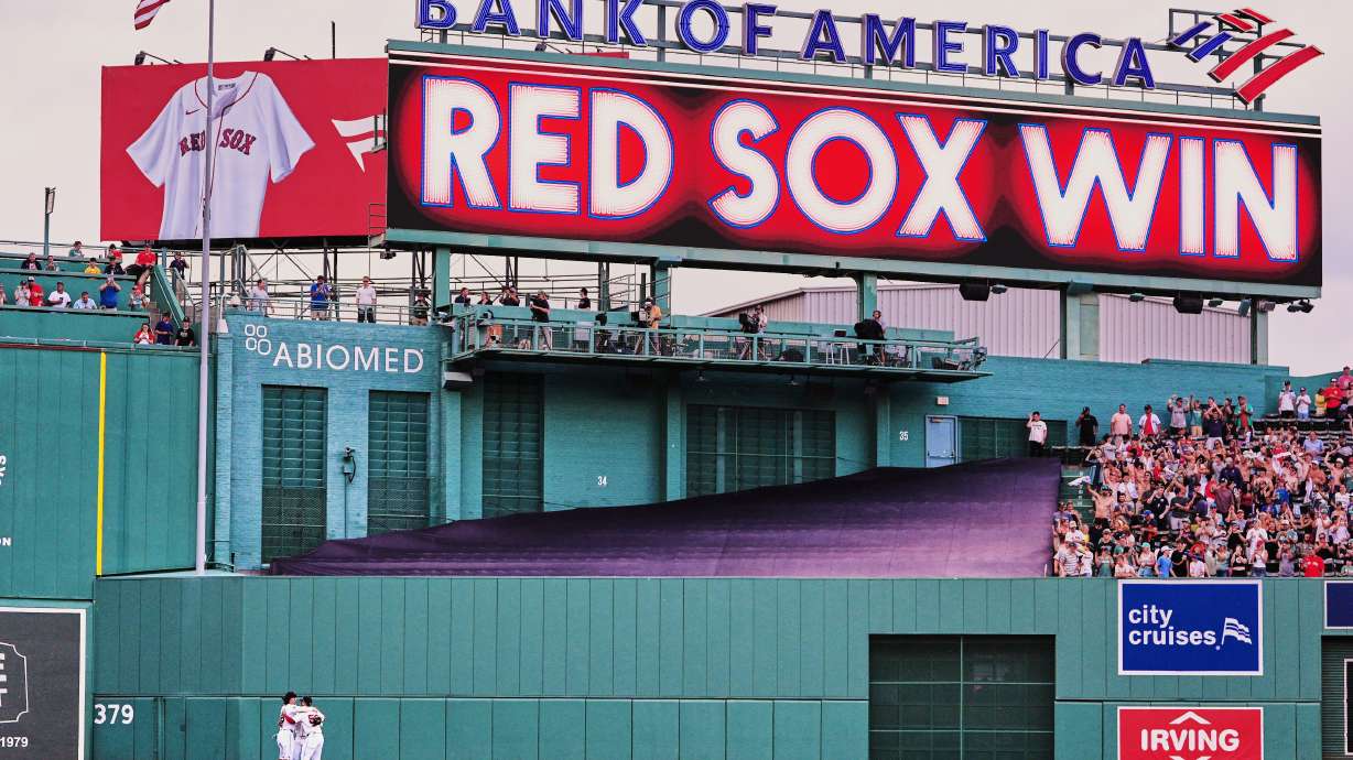 Boston Red Sox outfielders celebrate after defeating the Baltimore Orioles in the first baseball game of a doubleheader, Wednesday, July 22, 2026, in Boston.