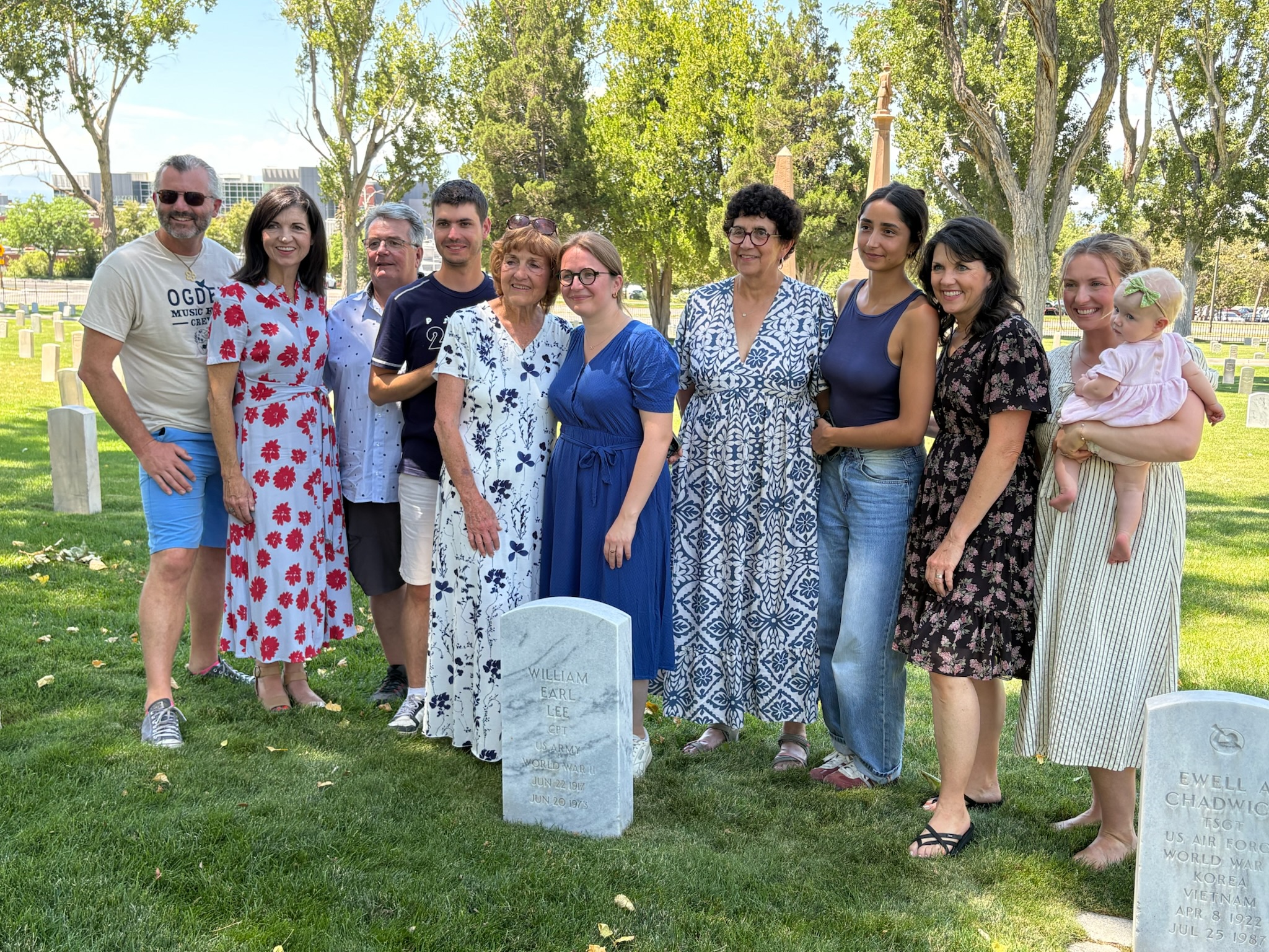 The Duval and Lee families at the grave of William Earl Lee in Salt Lake City on July 18.