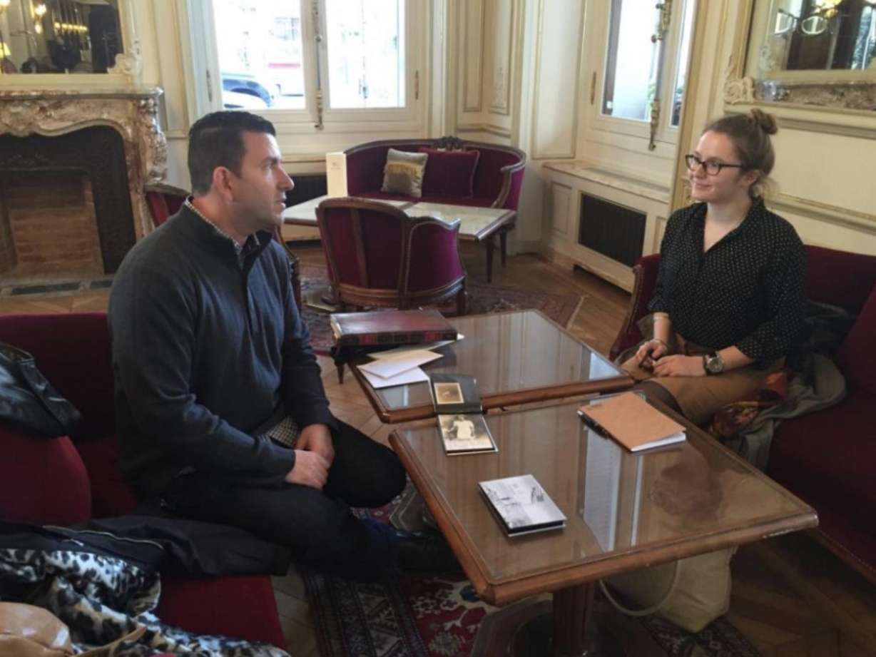 Dave Lee meets Marie Duval in a Paris hotel in November 2015 to pick up family photos that his grandfather lost in France during World War II and her grandmother found when she was a little girl.