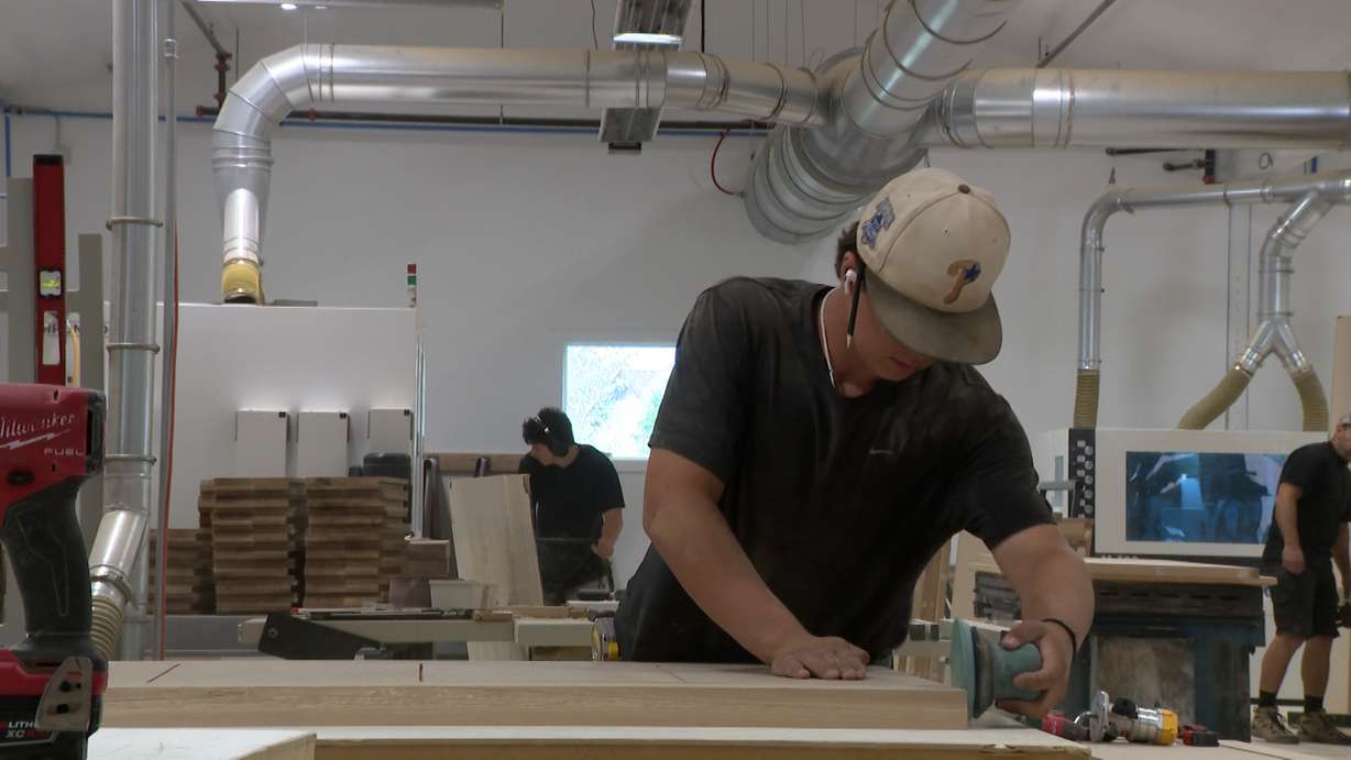 Workers for Frontier Woodworks in Francis are pictured on Wednesday.