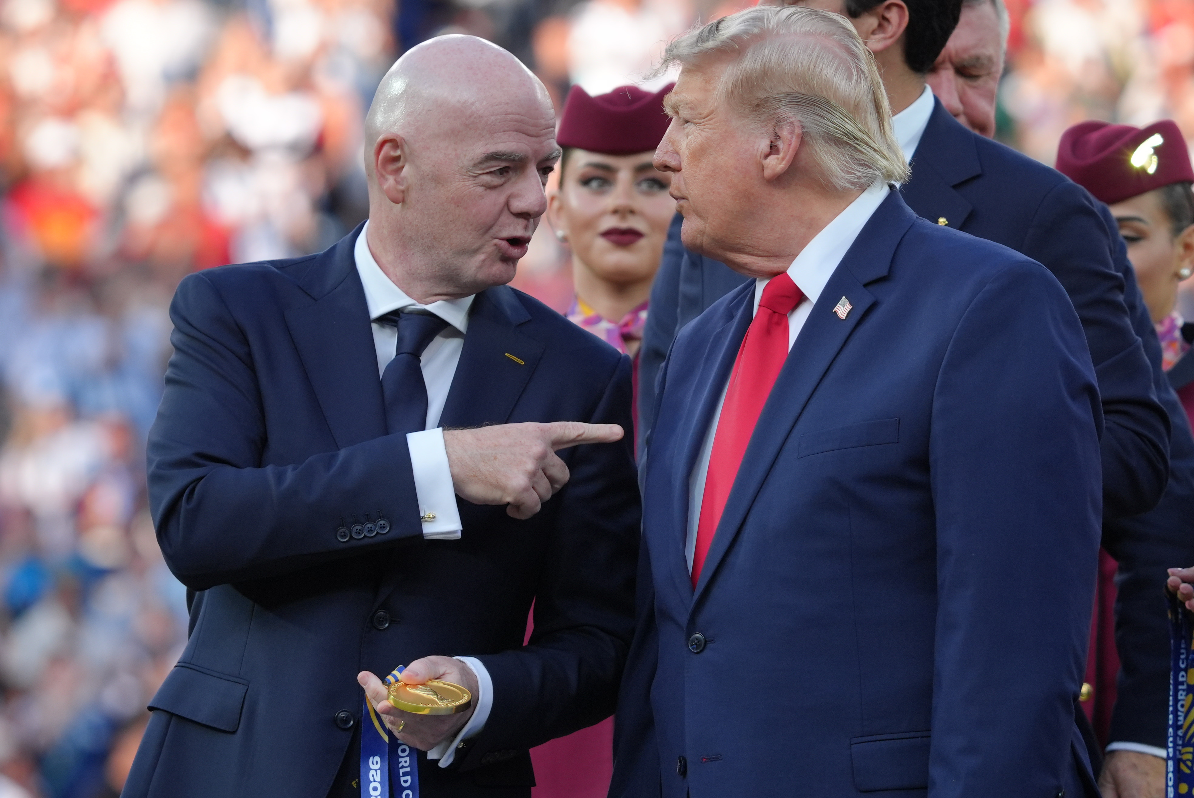 FIFA President Gianni Infantino, left, and President Donald J. Trump talk as they wait to congratulate the Spanish players after the World Cup final soccer match between Spain and Argentina in East Rutherford, N.J., near New York, Sunday, July 19, 2026. 