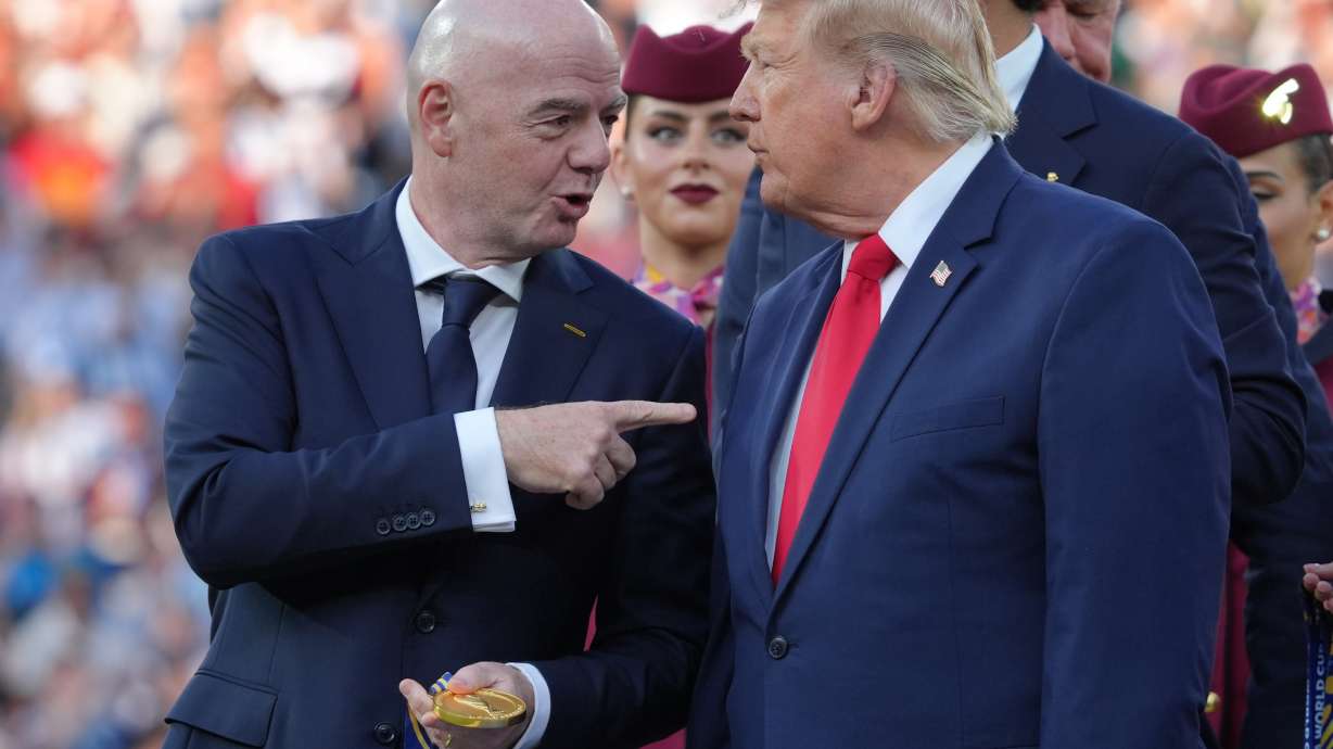 FIFA President Gianni Infantino, left, and President Donald J. Trump talk as they wait to congratulate the Spanish players after the World Cup final soccer match between Spain and Argentina in East Rutherford, N.J., near New York, Sunday, July 19, 2026.