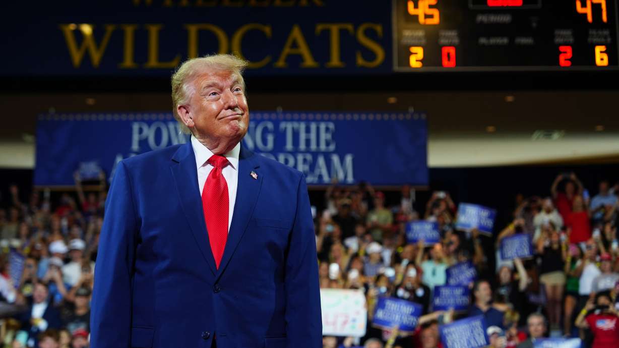 President Donald Trump appears on stage at Wheeler High School, Wednesday, July 22, 2026, in Marietta, Ga.