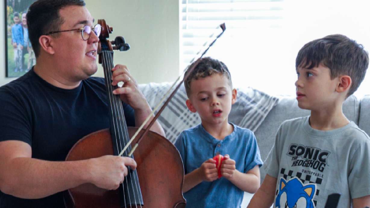 Mateus Rangel, of Provo, plays hymns with his children. He spoke about how he uses songs for "Hymns for Home and Church" in his church calling and with his family.