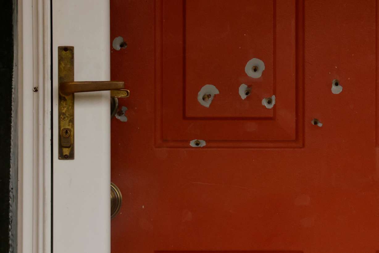 Bullet holes mark the front door of the house of tate Sen. John Hoffman and his wife who were shot earlier in the day on June 14, 2025, in Champlin, Minn. Yvette Hoffman said on Thursday at the sentencing for Vance Boelter that she sees a therapist weekly.