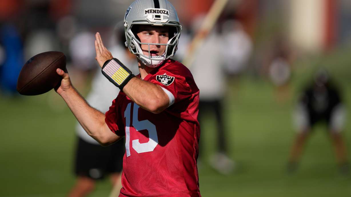 FILE - Las Vegas Raiders quarterback Fernando Mendoza throws during the NFL football team's practice Wednesday, June 10, 2026, in Henderson, Nev.