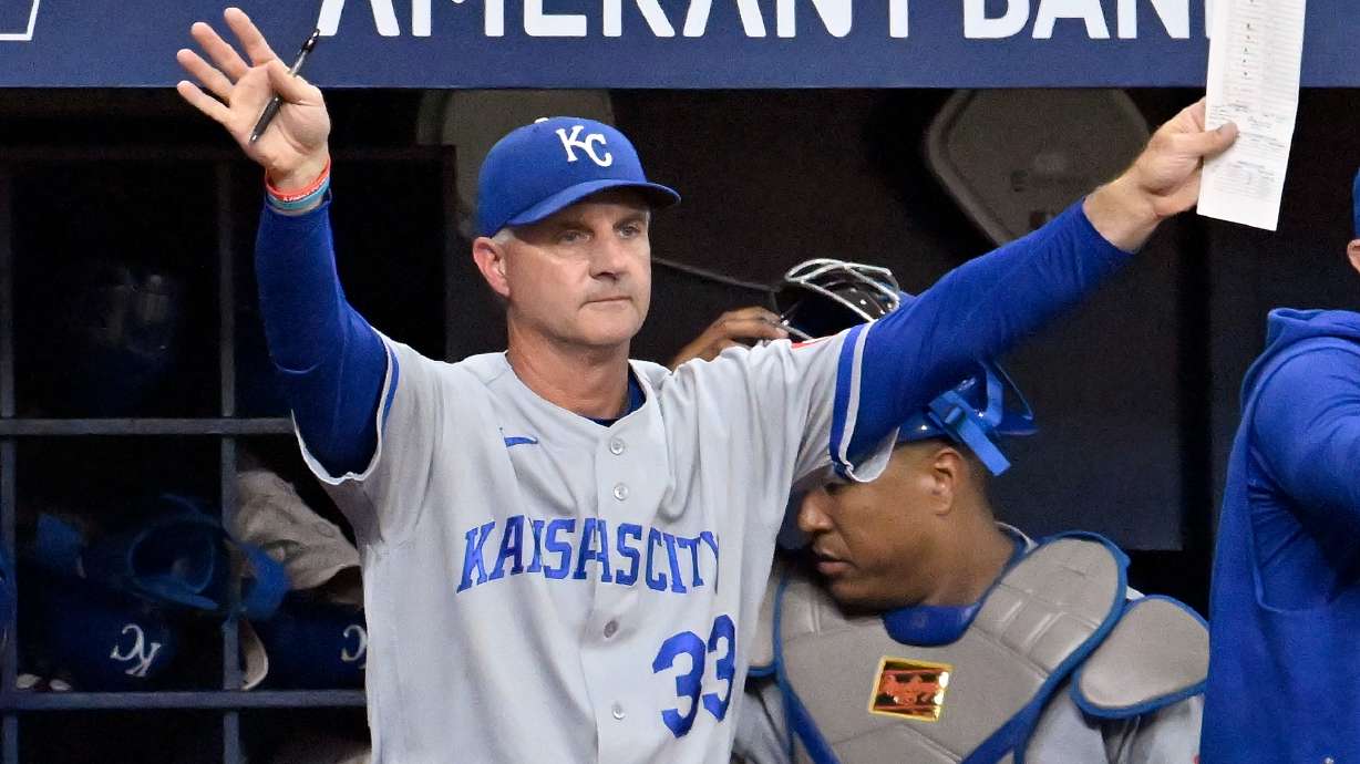 Kansas City Royals manager Matt Quatraro makes a lineup change during the ninth inning of a baseball game against the Tampa Bay Rays Tuesday, June 23, 2026, in St. Petersburg, Fla.