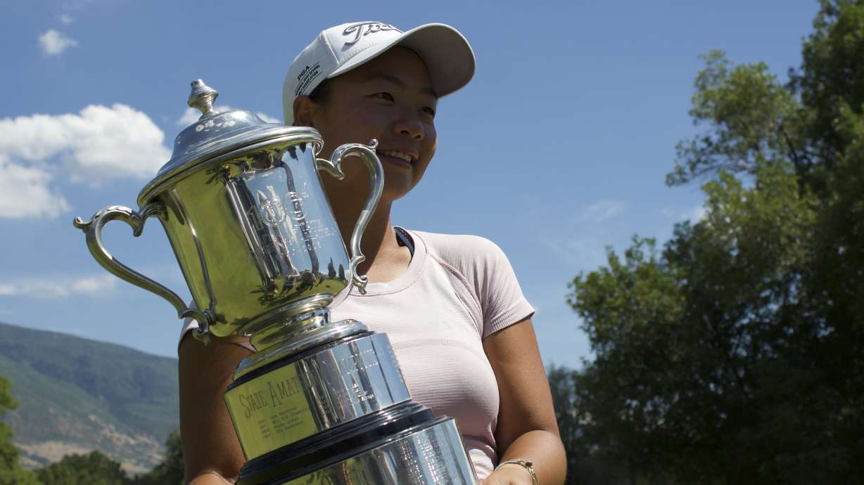 Westminster golfer Ashley Lam poses for photos after winning the final of the 120th Utah women's state amateur, Thursday, July 23, 2026 at Oakridge Country Club in Farmington.
