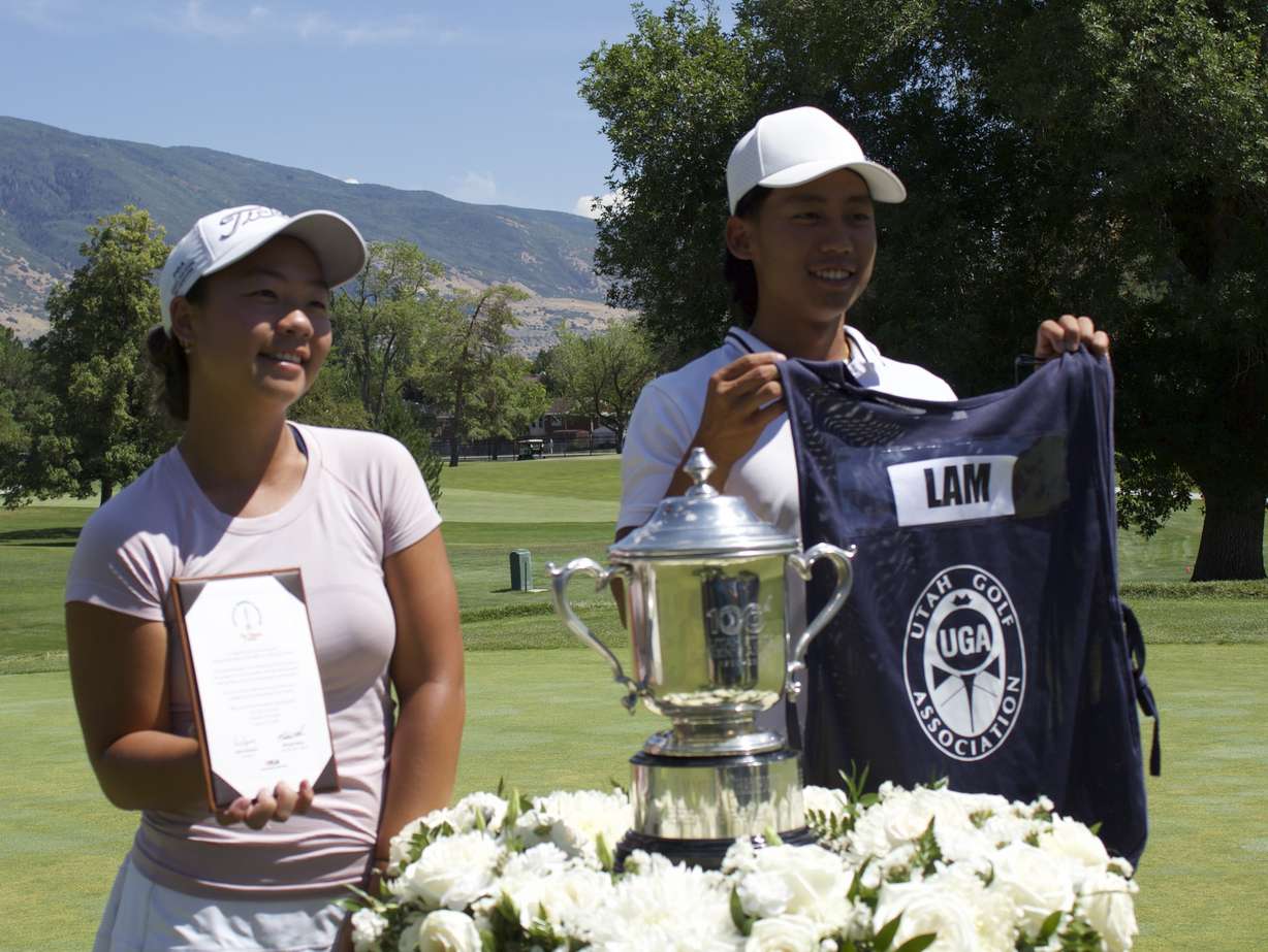 Westminster golfer Ashley Lam, left, with her brother and caddy Sean after winning the final of the 120th Utah women's state amateur, Thursday, July 23, 2026 at Oakridge Country Club in Farmington.