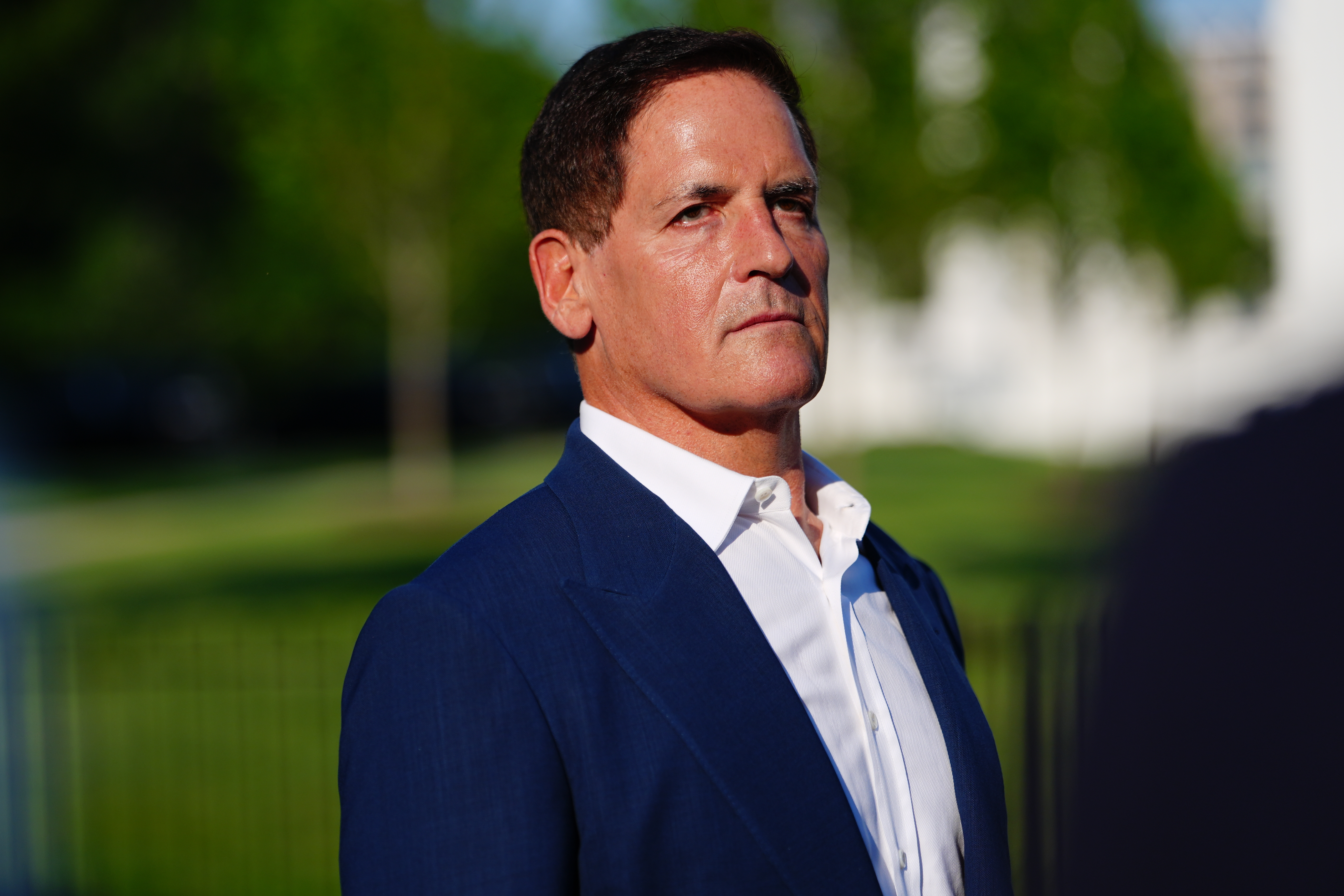 FILE - Mark Cuban talks with reporters after an event at the White House, May 18, 2026, in Washington. 