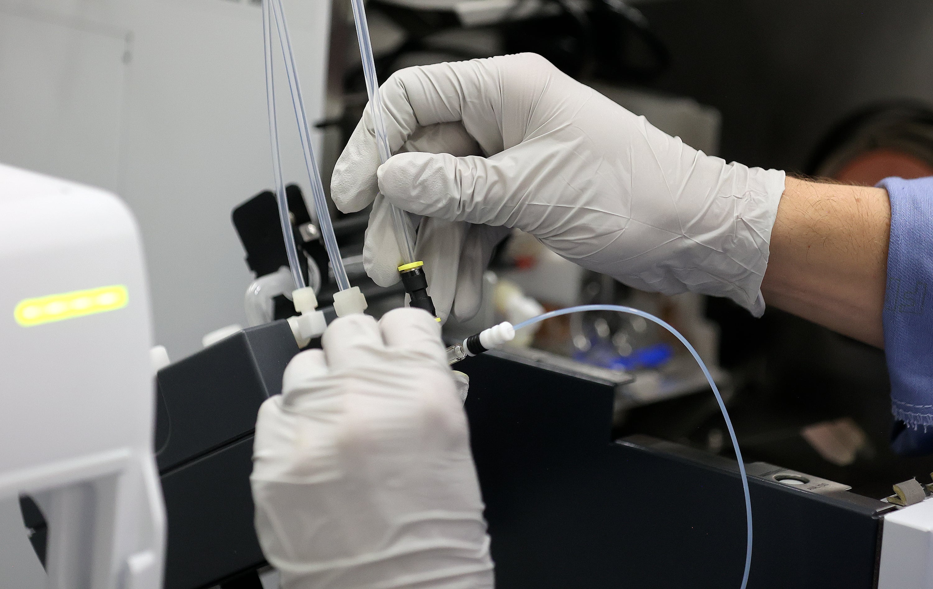 Ben Schroeder, University of Utah PhD candidate and researcher, cleans an ICP-MS (inductively coupled plasma mass spectrometer) in the ICP Lab at the University of Utah in Salt Lake City on Thursday.