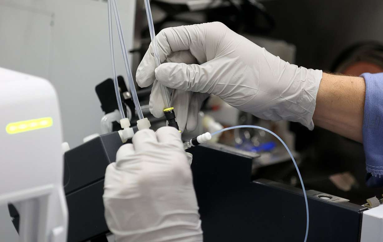 Ben Schroeder, University of Utah PhD candidate and researcher, cleans an ICP-MS (inductively coupled plasma mass spectrometer) in the ICP Lab at the University of Utah in Salt Lake City on Thursday.