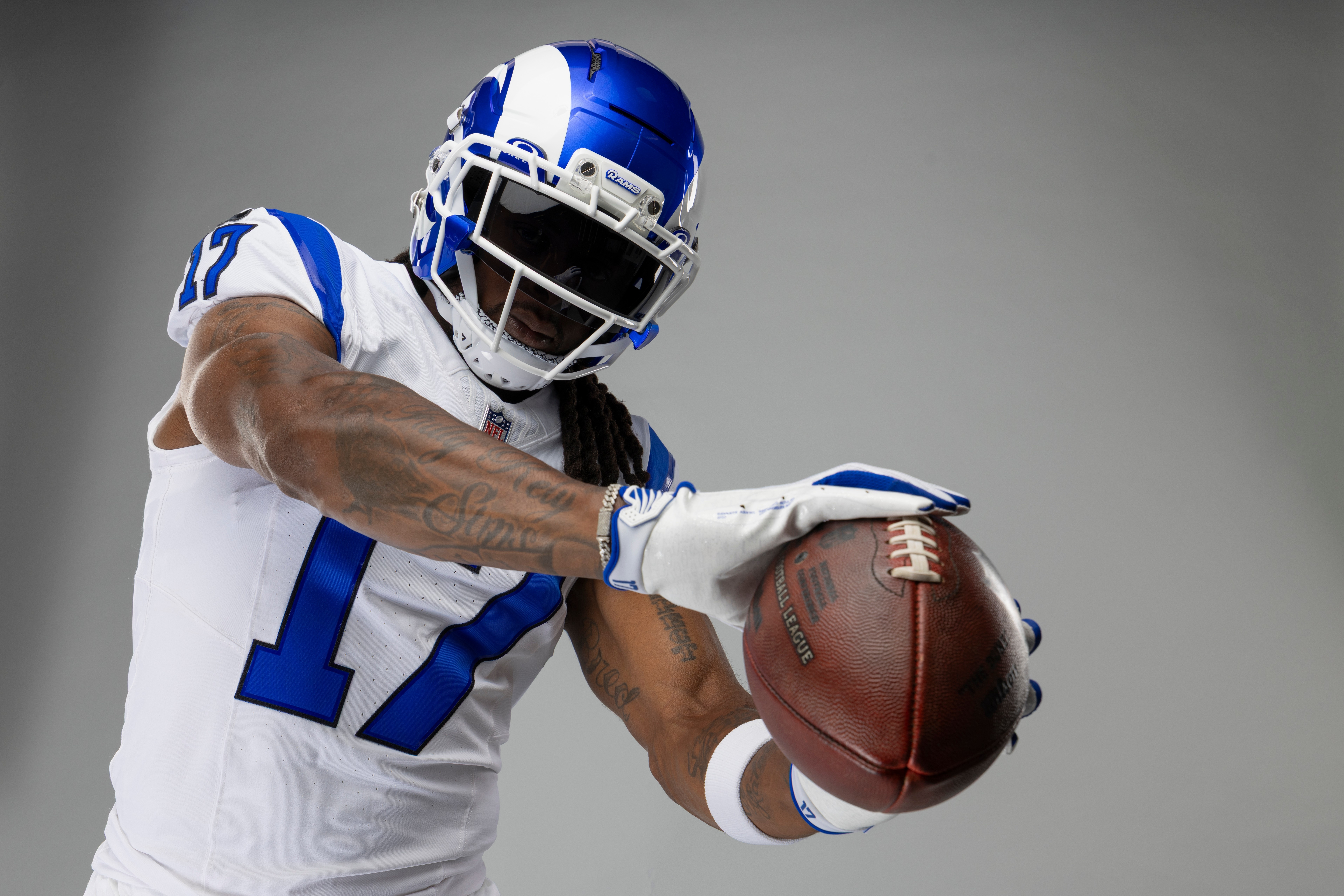 This undated photo provided by the Los Angeles Rams, Thursday, July 23, 2026, shows wide receiver Davante Adams posing in Los Angeles while wearing the Rams’ new “Fearsome White” alternate uniform. 