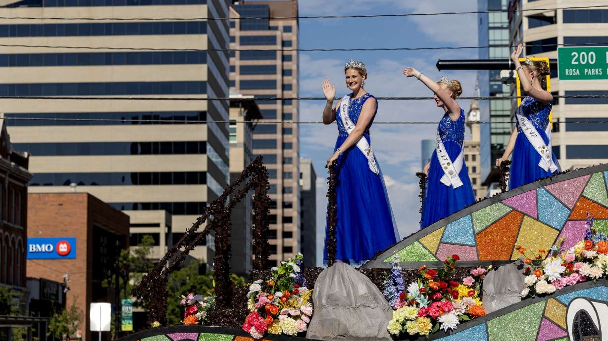 The Days of '47 royalty, queen Lindsey Christenson, attendants Daniela Bergantz, and Sarah Lowry, ride on a float in the Days of '47 Parade in Salt Lake City on Friday. Thousands of people lined the streets of Salt Lake City — some after camping out overnight — to take in the sights and sounds of the annual Days of '47 Parade.
