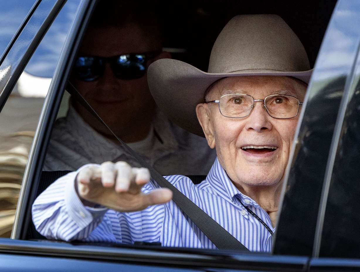President Dallin H. Oaks of The Church of Jesus Christ of Latter-day Saints rides in a vehicle in the Days of '47 Parade in Salt Lake City on Friday. Thousands of people lined the streets of Salt Lake City Friday — some after camping out overnight — to take in the sights and sounds of the annual Days of '47 Parade.