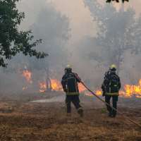 More than 250,000 people flee their homes in France and Spain as wildfires burn