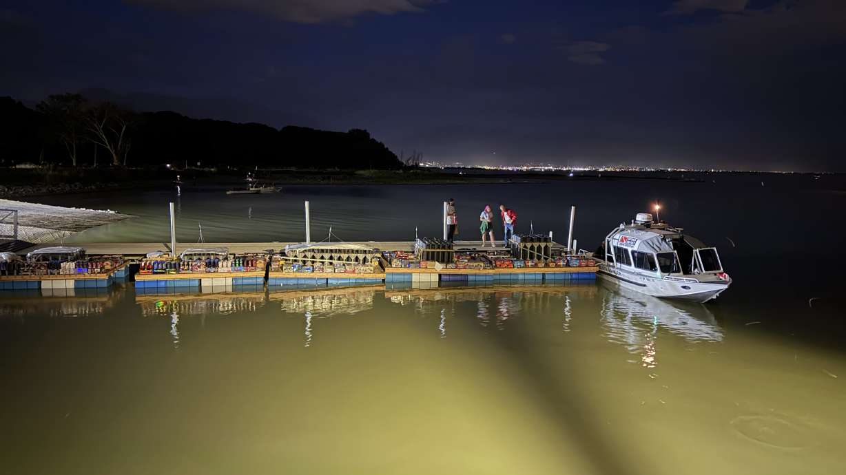 The western fireworks barge floats at the North Marina Park in Saratoga Springs at 9:45 p.m. on Friday. The fireworks were supposed to launch at the marina at 10 p.m.