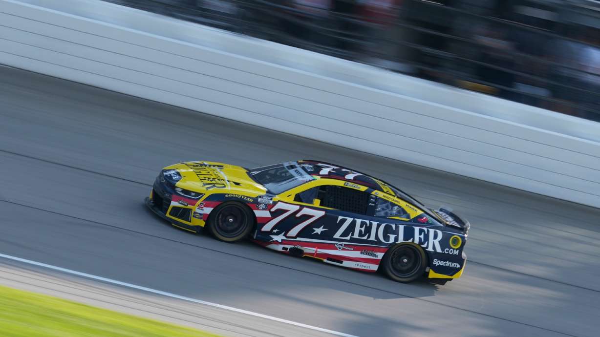 Carson Hocevar (77) drives during a NASCAR Cup Series auto race at Chicagoland Speedway in Joliet, Ill., Sunday, July 5, 2026.
