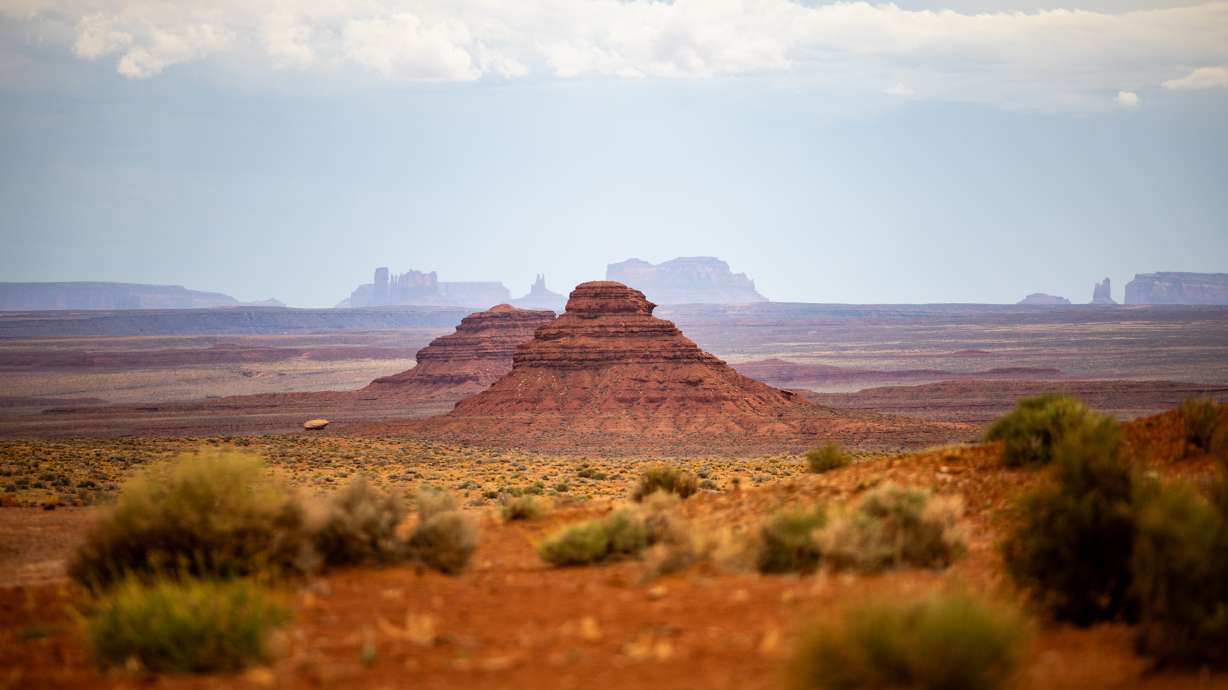 Buttes tower over sagebrush in the Valley of Gods at Bears Ears National Monument on June 3, 2025. A legal battle over the monument's size and the size of Grand Staircase-Escalante National Monument is heating up again after President Donald Trump shrank the monuments in July.