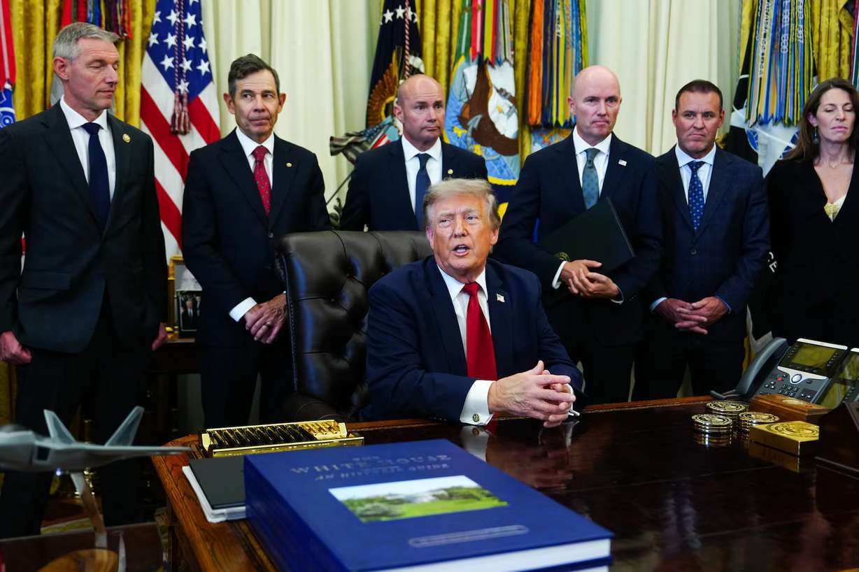 President Donald Trump speaks after signing executive orders modifying the Bears Ears National Monument and the Grand Staircase-Escalante National Monument in the Oval Office of the White House, July 13, in Washington. A group of outdoor brands sent a letter on Friday expressing opposition to the order.
