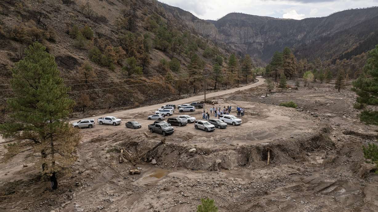 Members of Congress and federal, state, and local officials visited the Cottonwood Fire burn scar in the Fishlake National Forest, Friday. The double disaster has renewed questions about forest management.