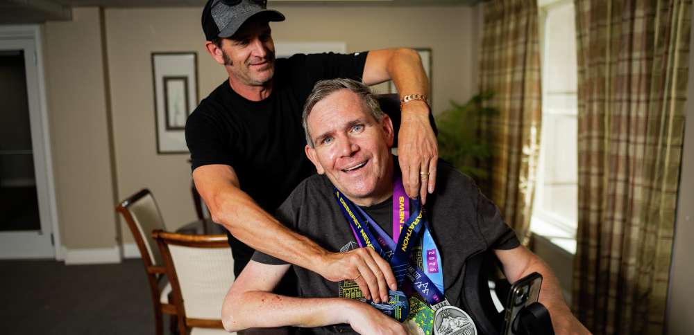 Dynamic duo: Man with MS does marathons with a push from his brother