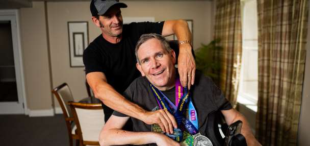 Dynamic duo: Man with MS does marathons with a push from his brother