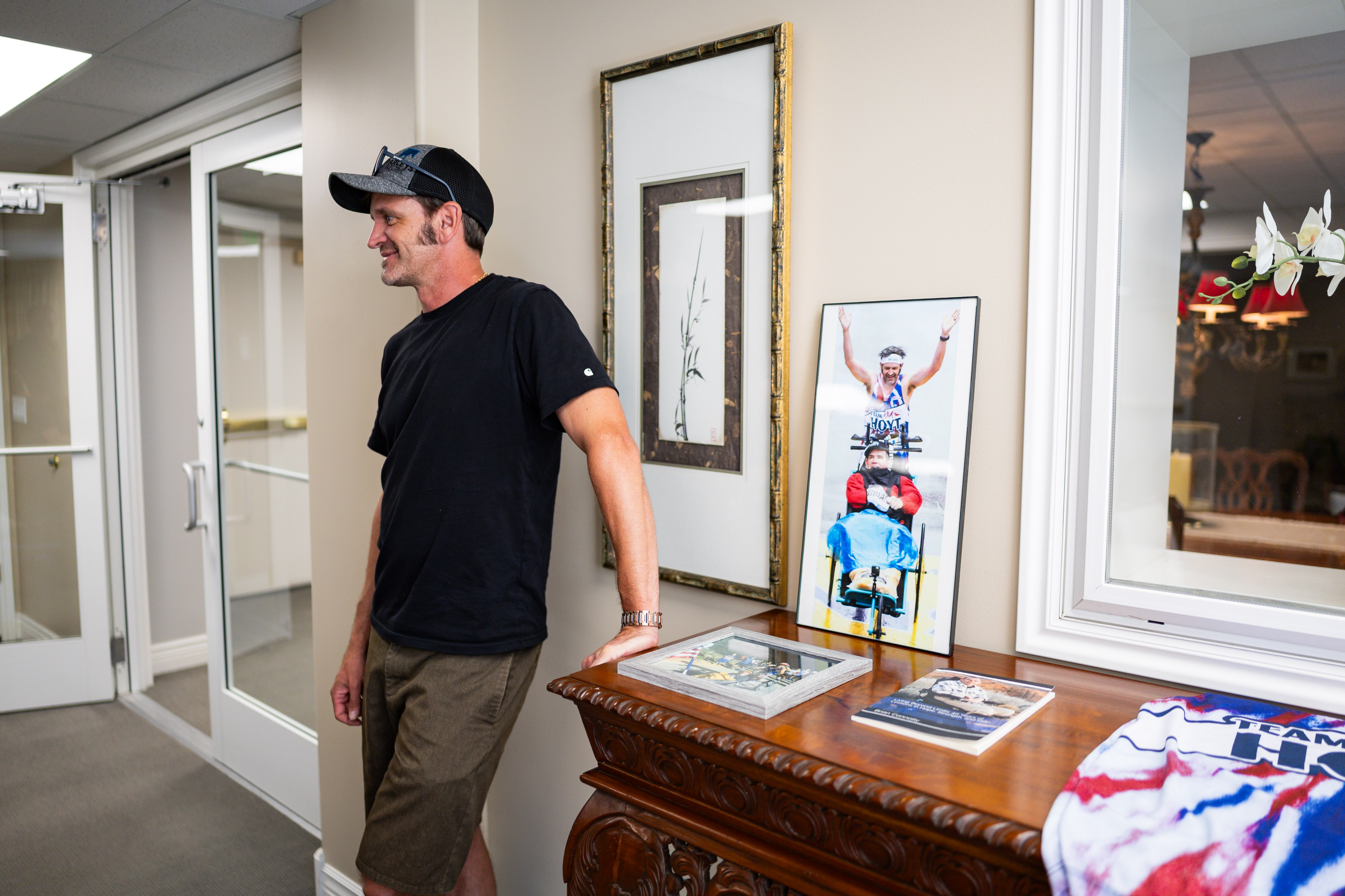 Danny Connolly and his brother Brian Connolly, who has MS, speak with the Deseret News in a common area at Brian's condominium in Salt Lake City on Tuesday. The Connollys ran in Friday's Deseret News Marathon.
