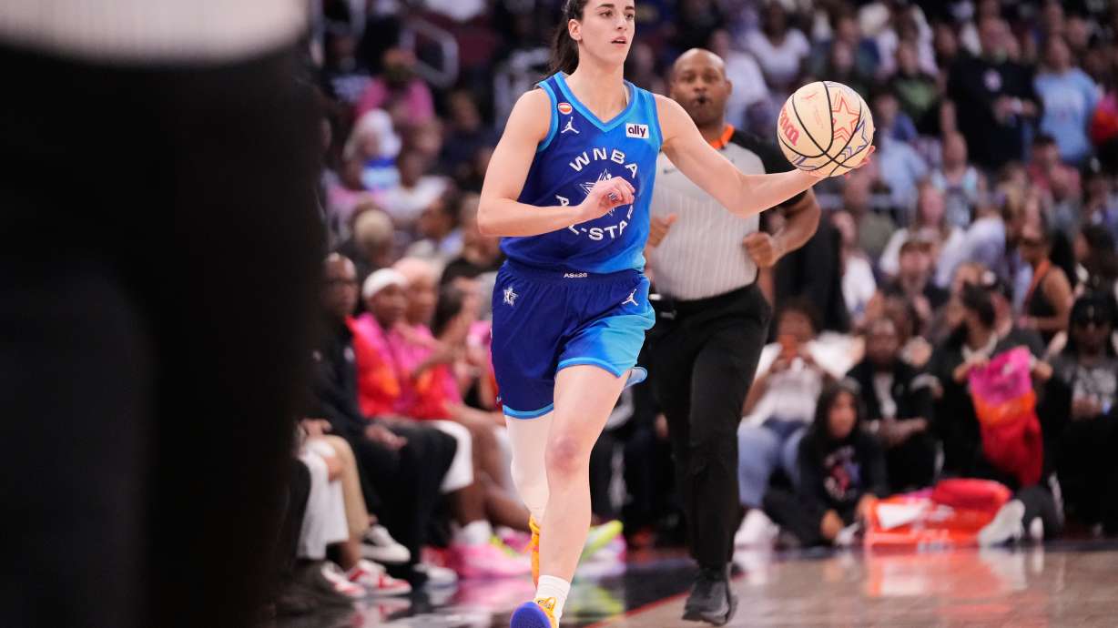 Team Spoon's Caitlin Clark looks to pass the ball during the first half of a WNBA All-Star basketball game against Team Coop in Chicago, Saturday, July 25, 2026.