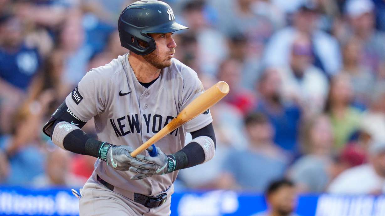 New York Yankees' Cody Bellinger singles to score Austin Wells during the sixth inning of a baseball game against the Philadelphia Phillies, Saturday, July 25, 2026, in Philadelphia.