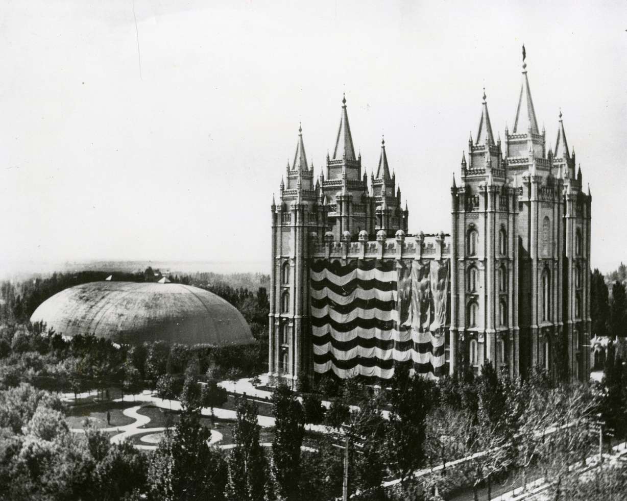 An American flag covers most of the Salt Lake Temple on Saturday, July 24, 1897, the 50th anniversary of the arrival of the pioneers in Salt Lake City.