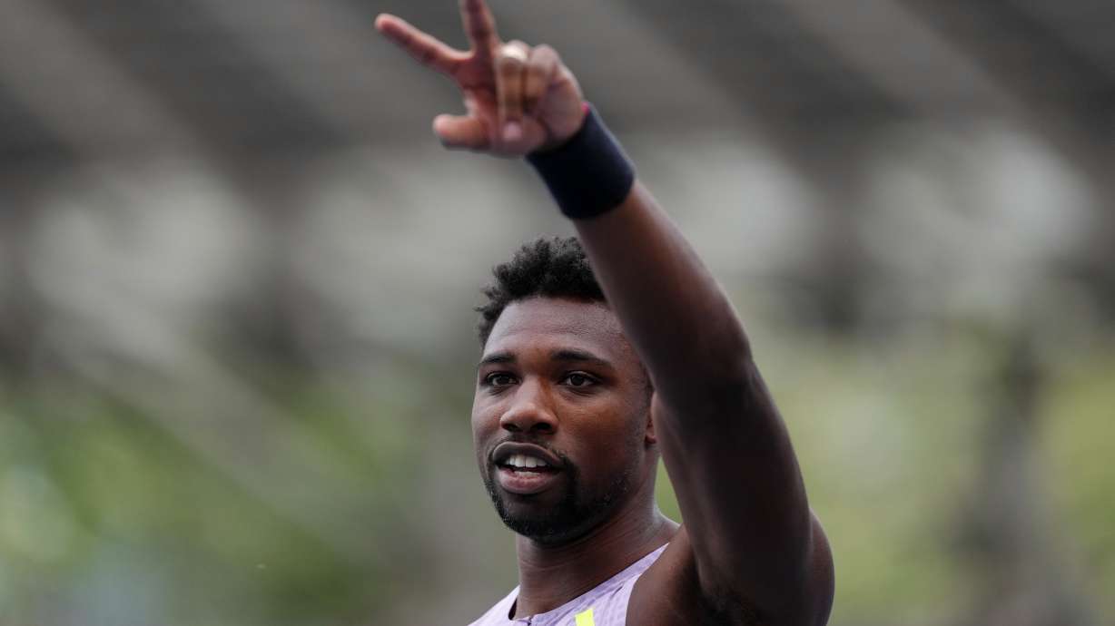 Noah Lyles, of the United States, gestures after finishing second in the men's 100 meters at the Meeting de Paris Diamond League athletics meet in Paris, Sunday, June 28, 2026.