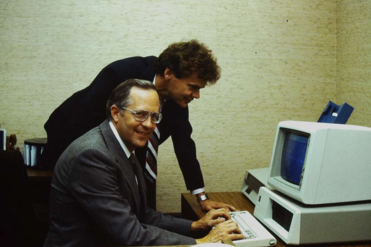 Alan Ashton and Bruce Bastian work at WordPerfect offices in Orem sometime in the 1980s.