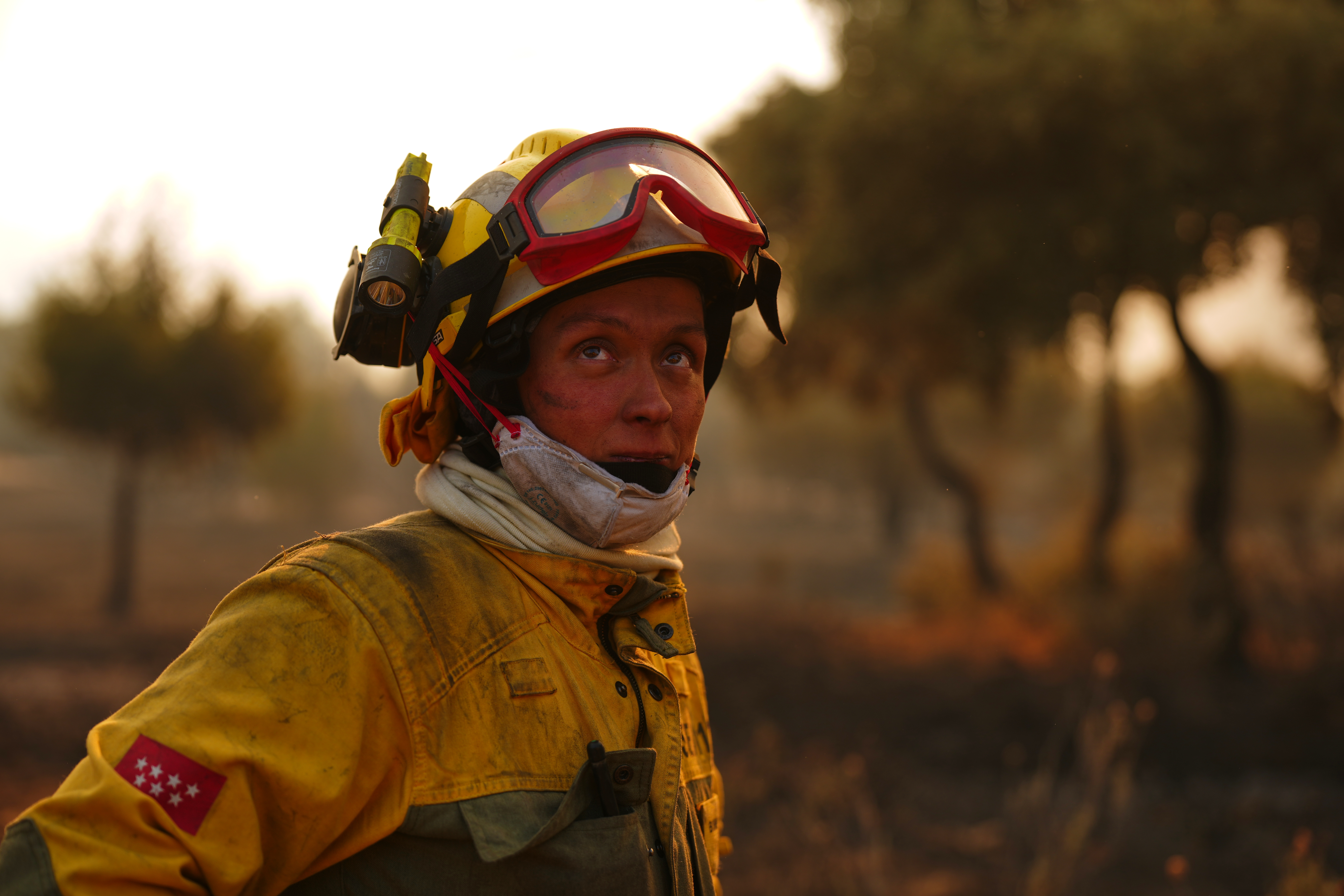 Firefighters battle a wildfire in San Martin de Valdeiglesias, west of Madrid, Spain, Sunday.