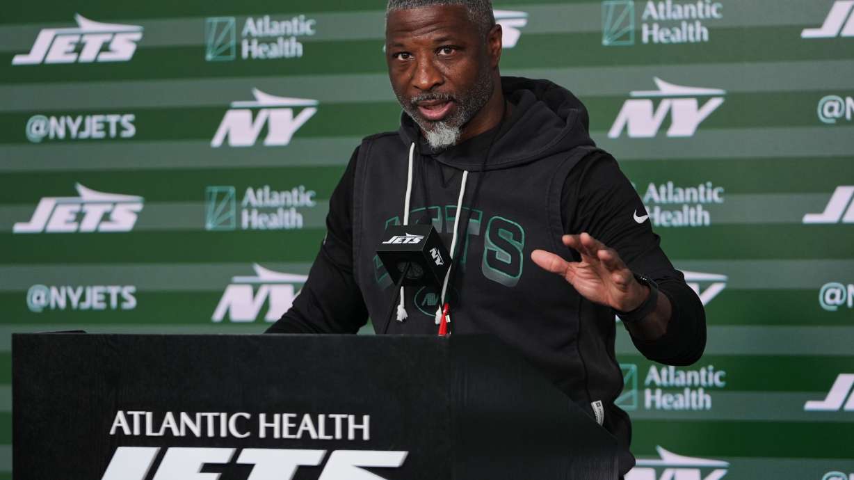 FILE - New York Jets head coach Aaron Glenn speaks at a news conference during rookie minicamp at the NFL football team's practice facilit, May 8, 2026, in Florham Park, N.J.