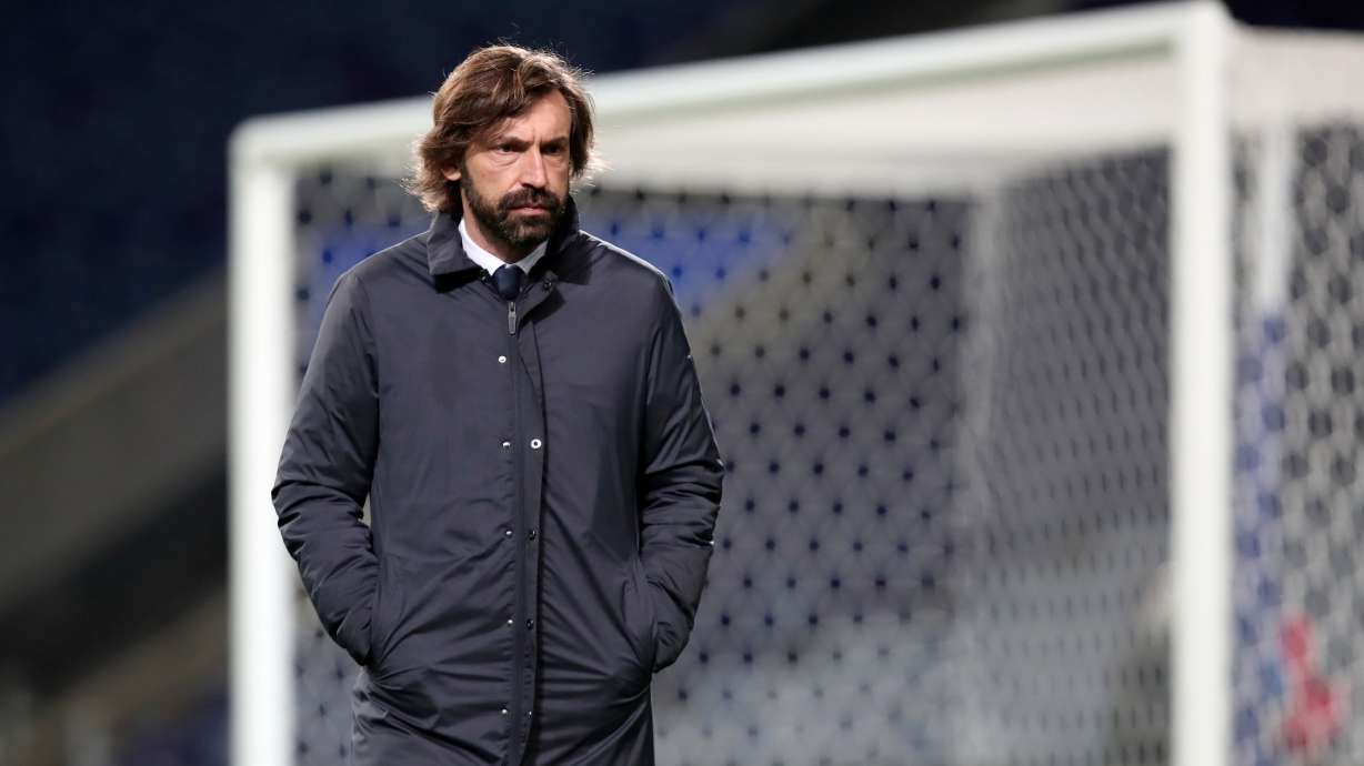 FILE - Juventus' head coach Andrea Pirlo stands on the pitch during warmup before the Champions League round of 16, first leg, soccer match between FC Porto and Juventus in Porto, Portugal, on Feb. 17, 2021.