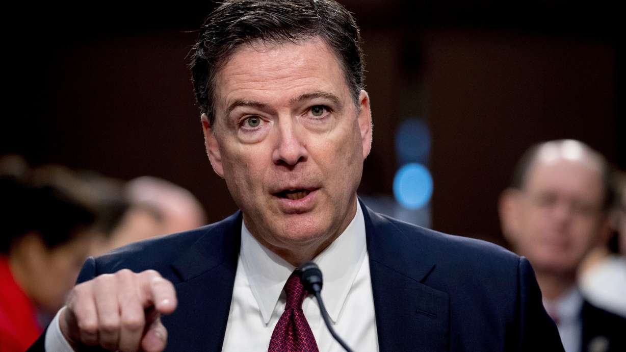 Former FBI Director James Comey speaks during a Senate Intelligence Committee hearing on Capitol Hill in Washington, June 8, 2017. Comey is urging a judge to throw out federal charges against him.