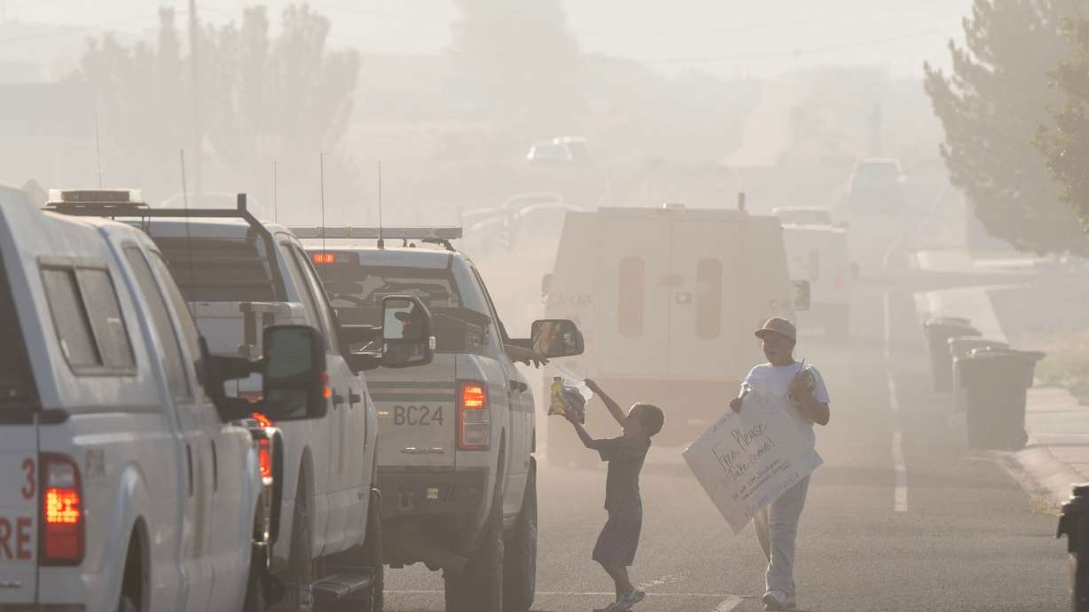 Dak Anderson and his cousin Raiden Gillins hand out donated supplies to firefighters as they begin another day in the smoke from the Cottonwood Fire in Beaver on Wednesday, July 1. More than a third of Americans in the market for a new home say indoor air quality is a top priority, a new survey found.